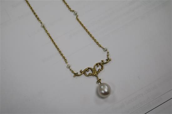 An 18ct gold and cultured? pearl drop necklace, the chain set with seed pearls, 62cm.